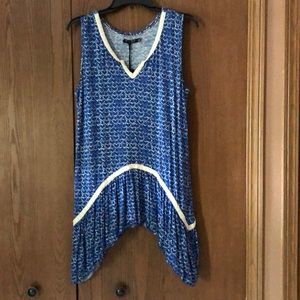 Cute sleeveless sharkbite hem  tunic top
